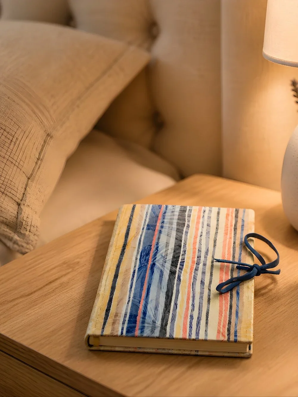 (#3) NWOT leather-bound wrap journal featuring a multi-colored vertical stripe